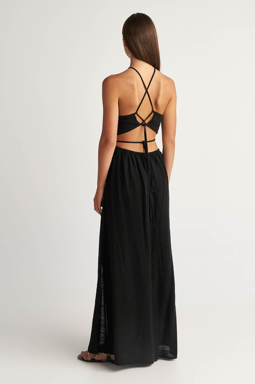 gauze maxi dress Marisol Smocked This bohemian maxi dress features spaghetti straps with a cross back and a tiered maxi skirt on solid black woven cotton material. Natori Cotton Gauze Maxi Halter